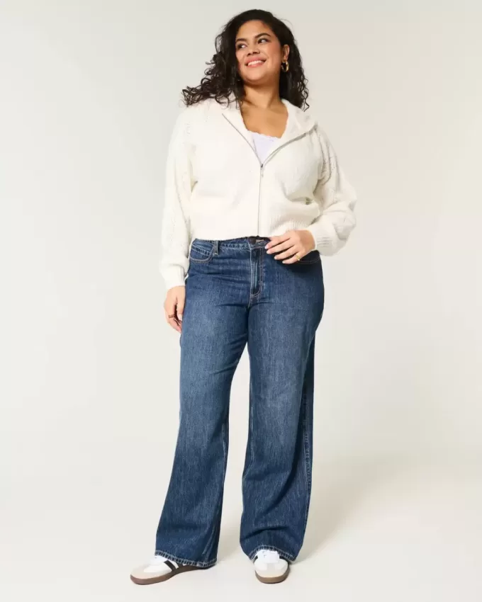 Jeans larghi a vita media e lavaggio scuro con effetto curvy