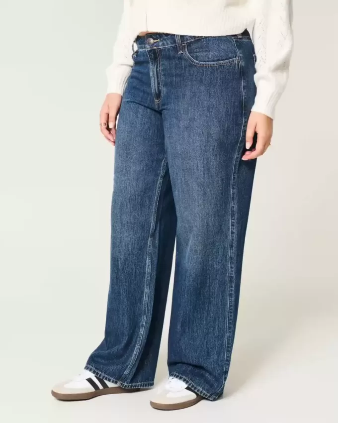 Jeans larghi a vita media e lavaggio scuro con effetto curvy
