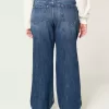 Jeans larghi a vita media e lavaggio scuro con effetto curvy