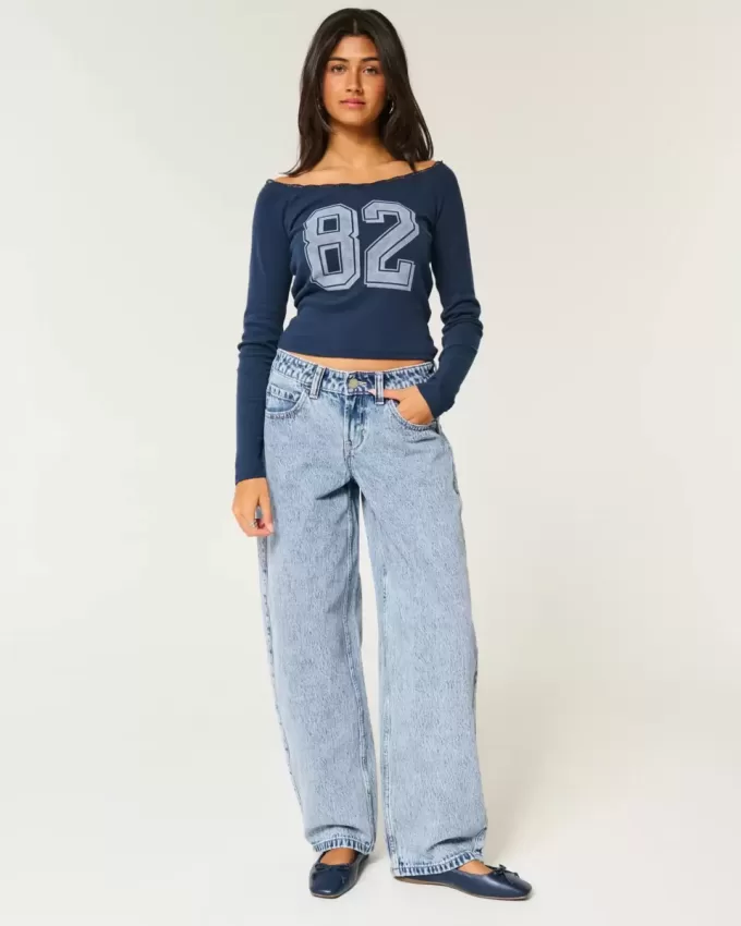 Jeans larghi affusolati a vita bassa con lavaggio chiaro