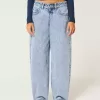 Jeans larghi affusolati a vita bassa con lavaggio chiaro