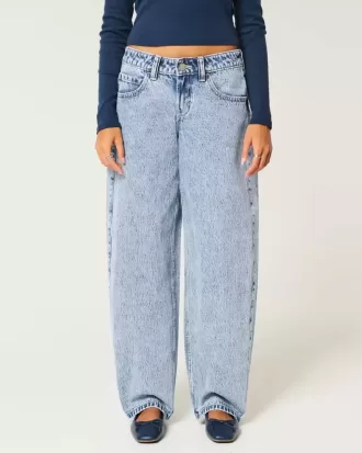 Jeans larghi affusolati a vita bassa con lavaggio chiaro