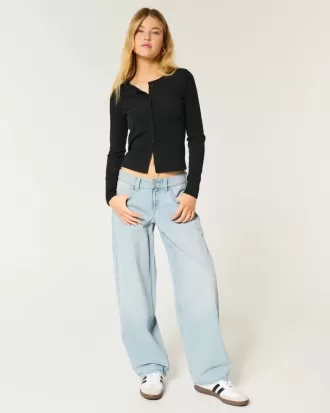 Jeans larghi affusolati a vita bassa con lavaggio medio