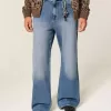 Jeans larghi bootcut lavaggio medio
