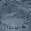 Jeans larghi bootcut lavaggio medio