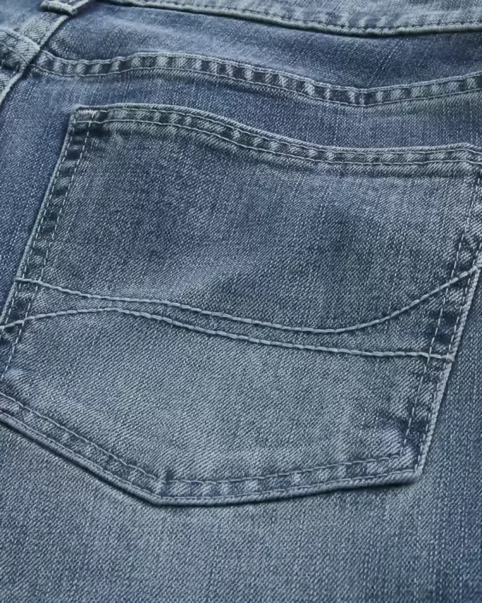 Jeans larghi bootcut lavaggio medio