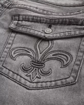 Jeans larghi bootcut ricamati neri lavati