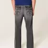 Jeans larghi bootcut ricamati neri lavati