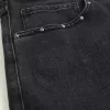 Jeans larghi borchiati neri lavati