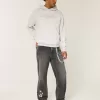 Jeans larghi con grafica a stella nera lavata
