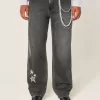 Jeans larghi con grafica a stella nera lavata