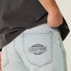 Jeans larghi con grafica Downforce Racing Light Wash