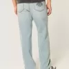 Jeans larghi con grafica Downforce Racing Light Wash