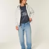 Jeans larghi con grafica Eagle e lavaggio medio