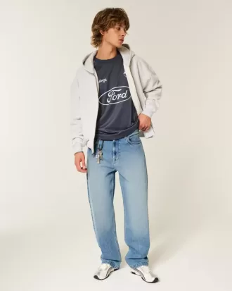 Jeans larghi con grafica Eagle e lavaggio medio