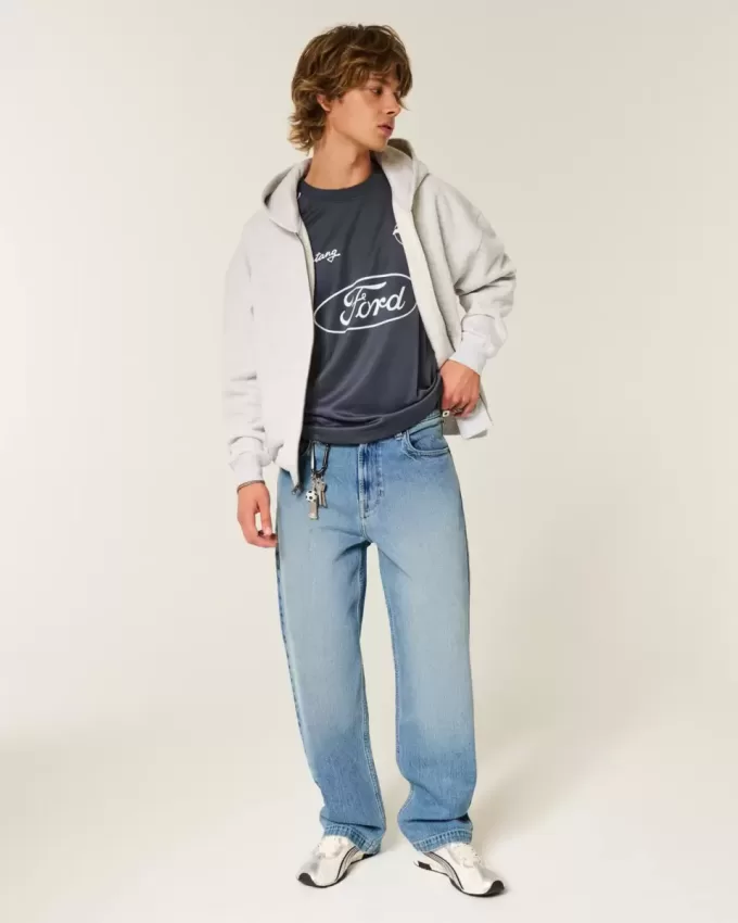 Jeans larghi con grafica Eagle e lavaggio medio