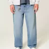 Jeans larghi con grafica Eagle e lavaggio medio