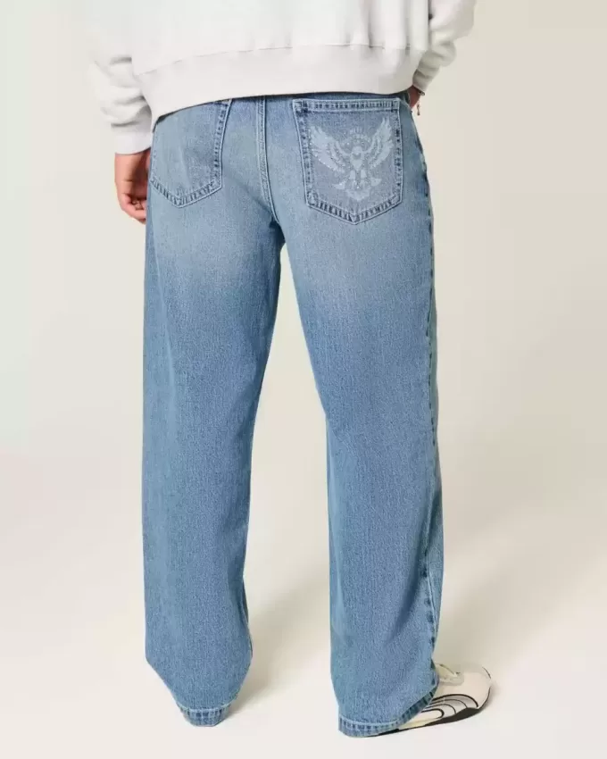 Jeans larghi con grafica Eagle e lavaggio medio
