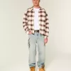 Jeans larghi con grafica lavaggio chiaro