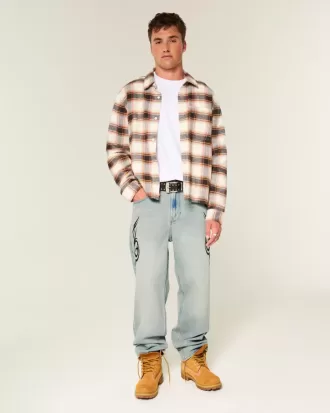 Jeans larghi con grafica lavaggio chiaro
