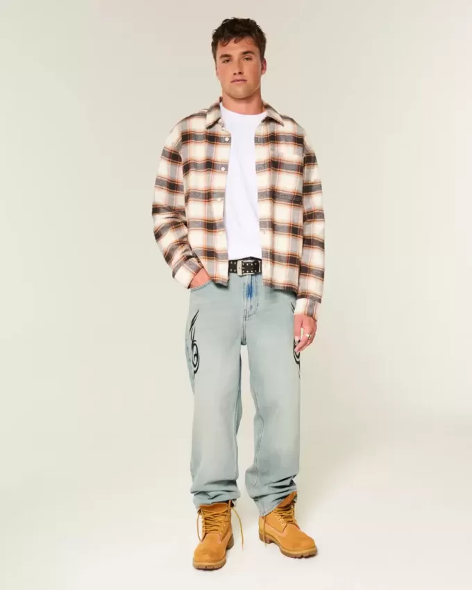 Jeans larghi con grafica lavaggio chiaro