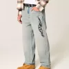 Jeans larghi con grafica lavaggio chiaro