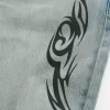 Jeans larghi con grafica lavaggio chiaro