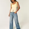Jeans larghi con grafica Los Angeles a lavaggio medio e vita bassa
