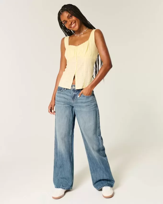 Jeans larghi con grafica Los Angeles a lavaggio medio e vita bassa