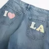 Jeans larghi con grafica Los Angeles a lavaggio medio e vita bassa