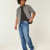 Jeans larghi con grafica rosa lavaggio scuro