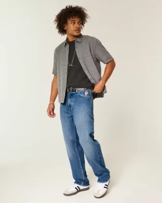 Jeans larghi con grafica rosa lavaggio scuro