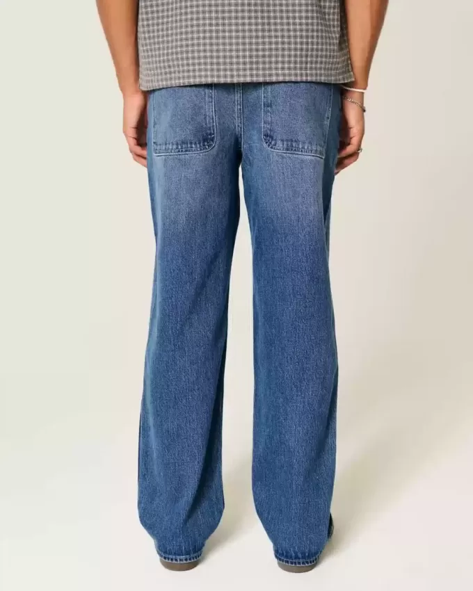 Jeans larghi con grafica rosa lavaggio scuro