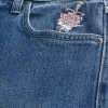 Jeans larghi con grafica rosa lavaggio scuro