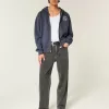 Jeans larghi con logo grafico nero lavato