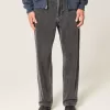 Jeans larghi con logo grafico nero lavato
