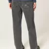 Jeans larghi con logo grafico nero lavato