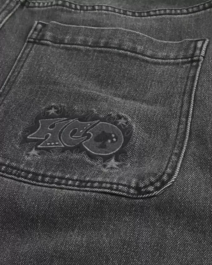 Jeans larghi con logo grafico nero lavato