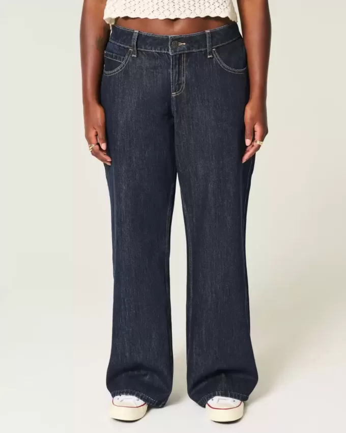 Jeans larghi con risvolto e vita bassa e lavaggio scuro