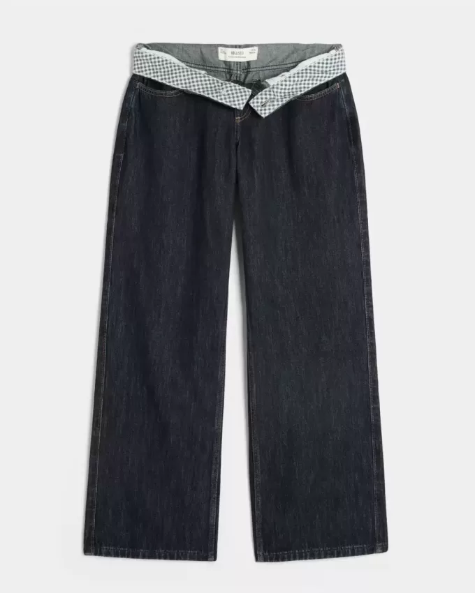 Jeans larghi con risvolto e vita bassa e lavaggio scuro