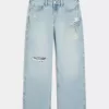 Jeans larghi con stampa grafica e lavaggio chiaro strappati a vita bassa