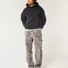 Jeans larghi da carpentiere mimetici