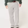 Jeans larghi da pittore a righe ferroviarie