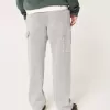 Jeans larghi da pittore a righe ferroviarie