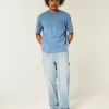 Jeans larghi da pittore con lavaggio chiaro