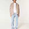 Jeans larghi da pittore con lavaggio chiaro