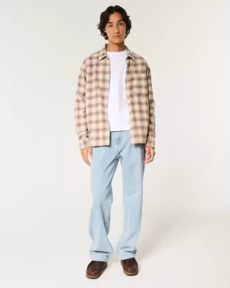 Jeans larghi da pittore con lavaggio chiaro