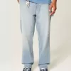 Jeans larghi da pittore con lavaggio chiaro