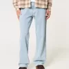 Jeans larghi da pittore con lavaggio chiaro