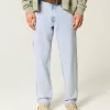 Jeans larghi da pittore con lavaggio chiaro